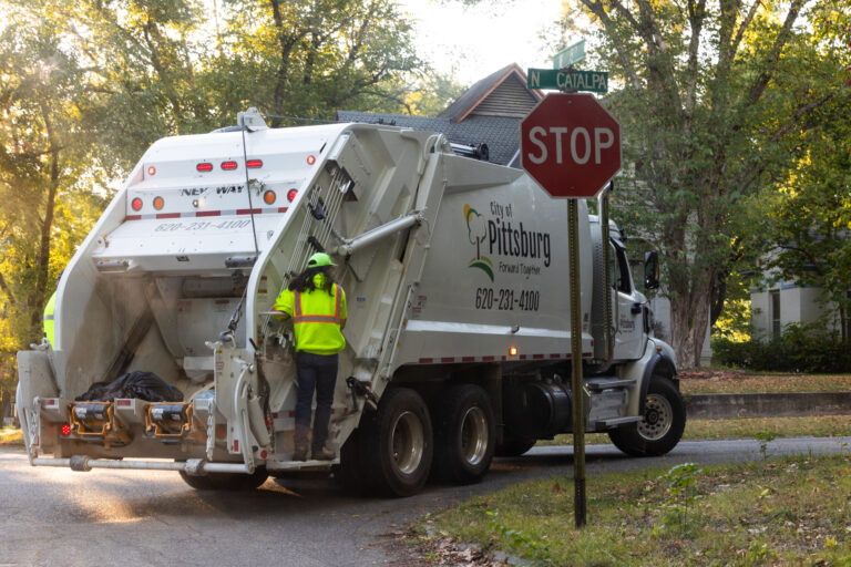 Garbage truck in a neighborhood